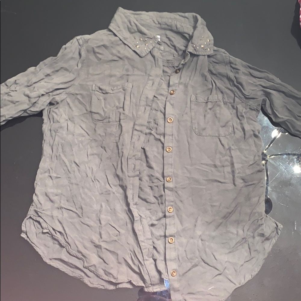 Button off dark green shirt